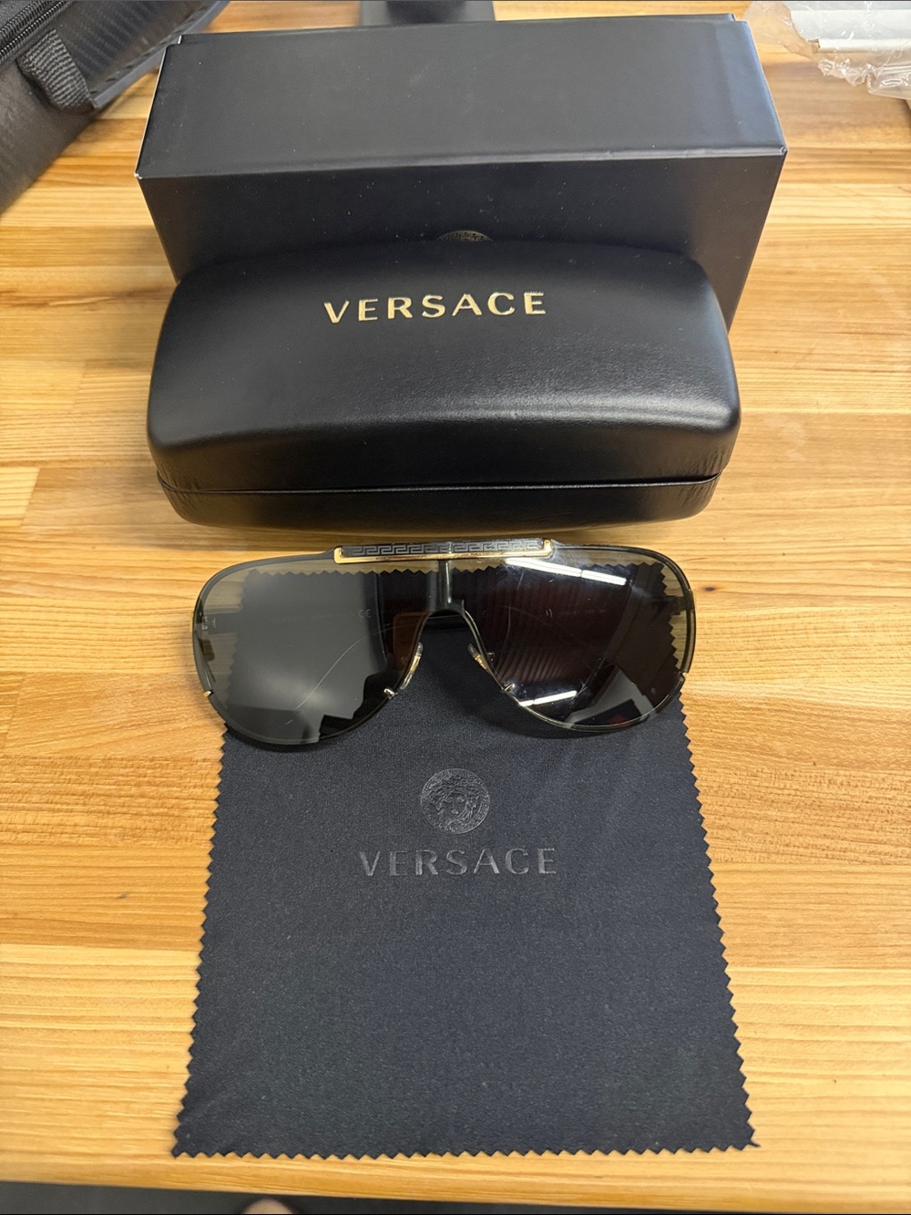 Versace Black and Gold Shield Sunglasses with Branded Case